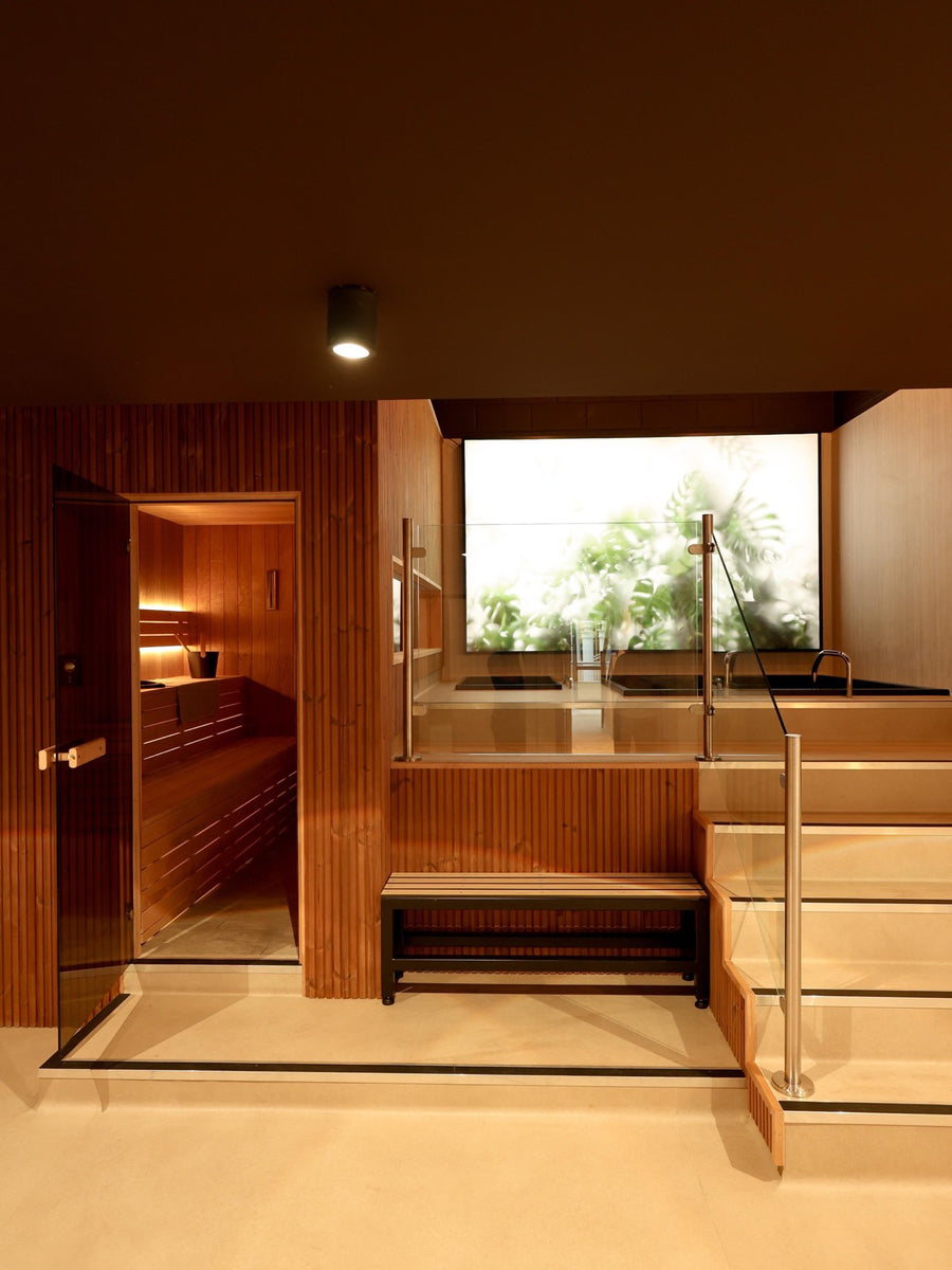 Sauna door open onto the stepped bathing deck