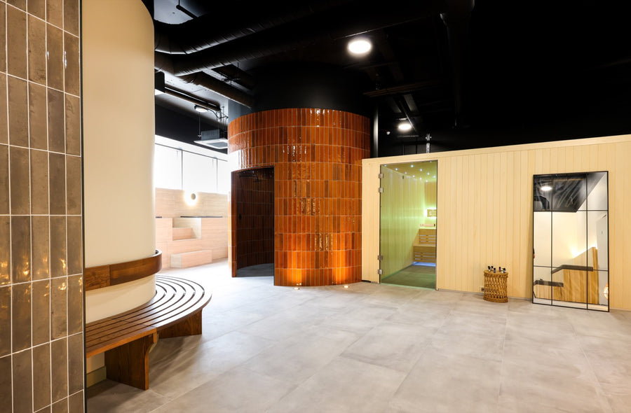 The wellness floor — feature drum, benching, tiled walls