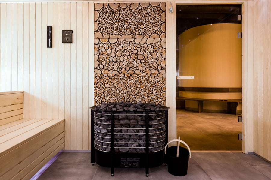 Round soaking tub and the stacked-log sauna wall