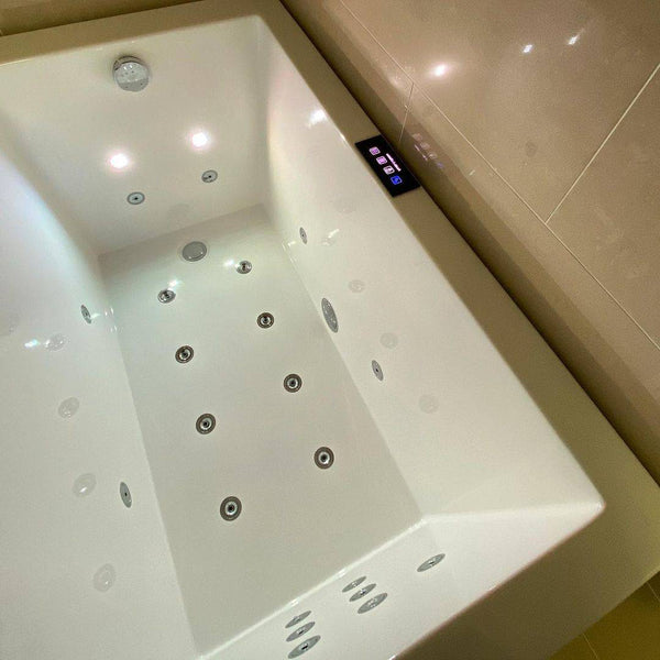 Omnitub Solo Plus 1250 x 750 UK deep soaking tub 600mm depth rectangular - installed in bathroom 2