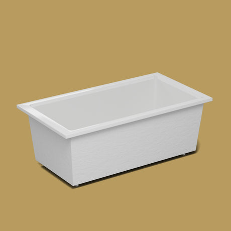 1750 x 950 Deep Soaking Tub – 600mm Depth – Wide Rectangular – Omnitub — side three-quarter on the feet kit [render:ext3q:feet] [bg:brass]