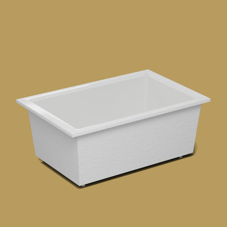 1600 x 1050 Deep Soaking Tub – 600mm Depth – Wide Rectangular – Omnitub — side three-quarter on the feet kit [render:ext3q:feet] [bg:brass]