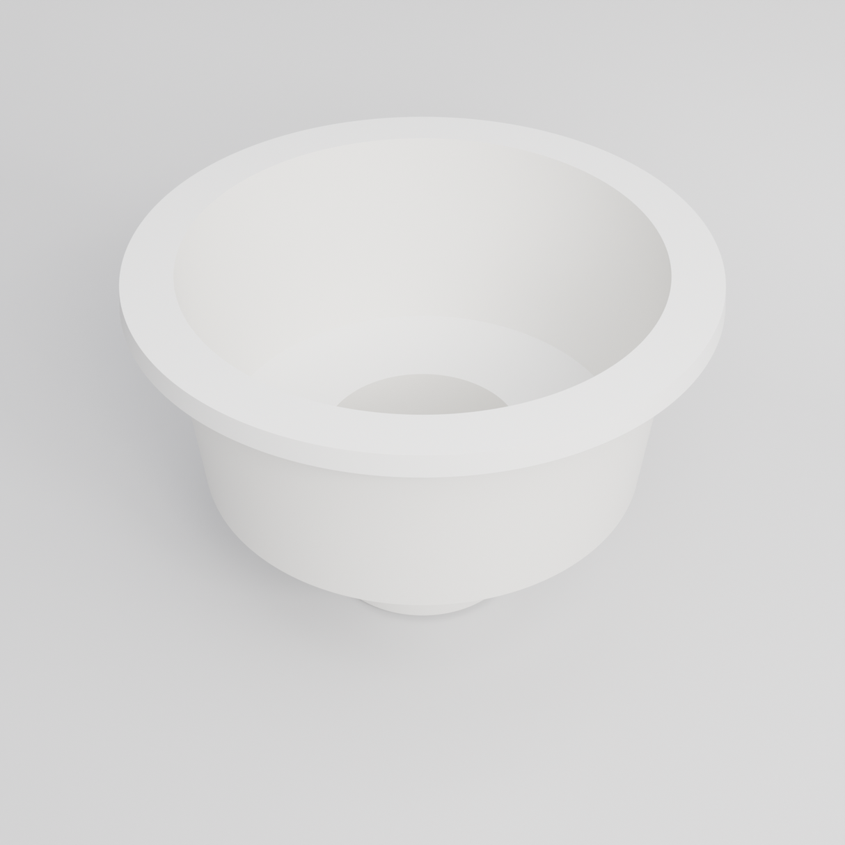 Omnitub 1500 Round Seated Soaking Tub in white — matt finish, 1500mm diameter, 1000mm internal depth with a 600mm seat and central footwell, three-quarter hero view into the seat and footwell, handmade in Britain [render:round:04-hero-3q]