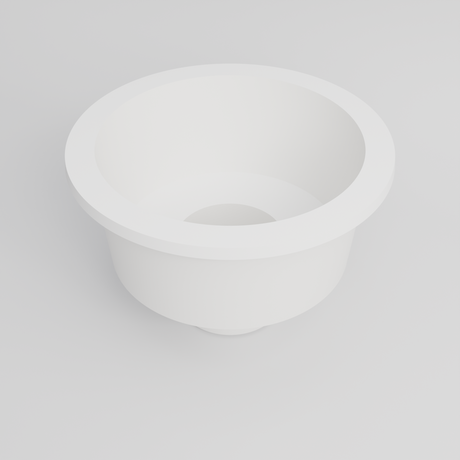 Omnitub 1500 Round Seated Soaking Tub in white — matt finish, 1500mm diameter, 1000mm internal depth with a 600mm seat and central footwell, three-quarter hero view into the seat and footwell, handmade in Britain [render:round:04-hero-3q]