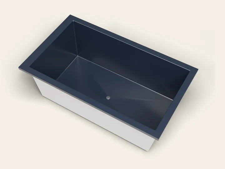 An Omnitub 1800 × 1050 deep soaking bath in RAL 5011 Steel Blue